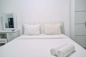 Minimalist Studio Room at Urbantown Serpong Apartment By Travelio